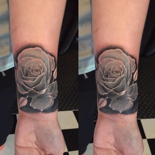Tender 3D realistic rose flower photo like tattoo on wrist with shadow