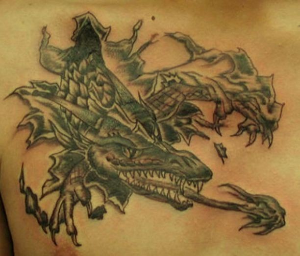 Terrible dragon under skin rip tattoo on chest