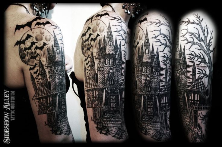 Terrifying black and white old castle tattoo on shoulder with bats