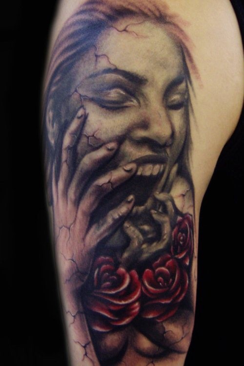 Terrifying  colored horror style arm tattoo of screaming woman with roses