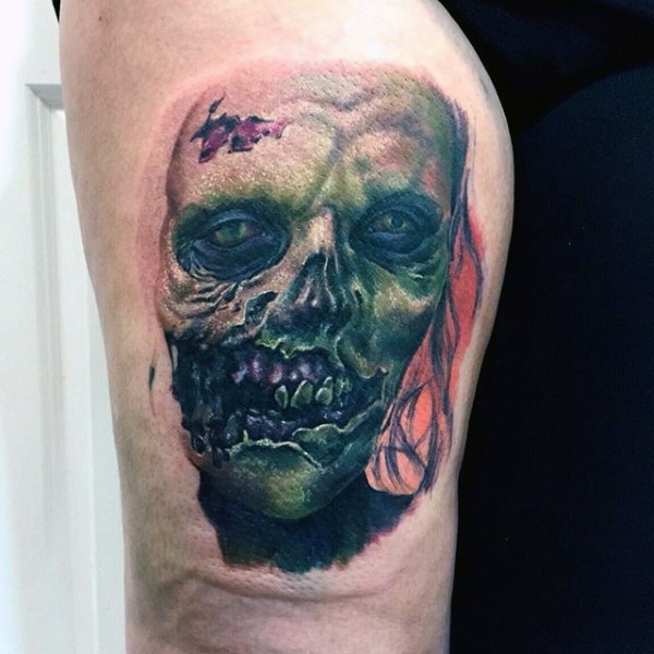 Terrifying detailed and colored arm tattoo on zombie face