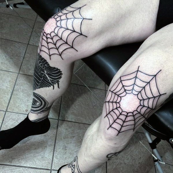 Thin dark black spiderweb simple design tattoo on both knees