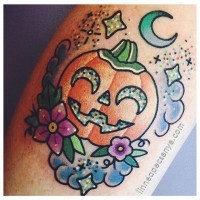 2D style cute little pumpkin with moon tattoo on leg