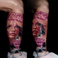 3D style very realistic doll portrait tattoo combined with lettering