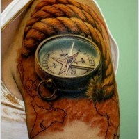 3 compass with rope and map of world tattoo