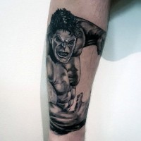 3D detailed painted black and white Hulk hero tattoo on forearm