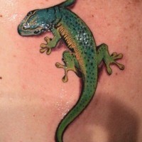3d green lizard tattoo on back