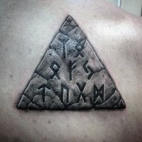 3D like big ancient triangle shaped tablet with lettering tattoo on upper back