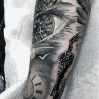 3D like big black ink antic key with clock tattoo on arm