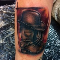 3D like big cowboy boots with hat tattoo on arm