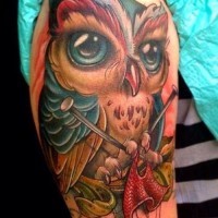 3D like big natural looking colorful shoulder tattoo of owl with knitting