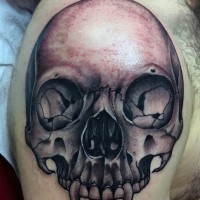 3D like black and white corrupted skull tattoo on arm top