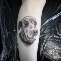 3D like black and white funny dog tattoo on leg
