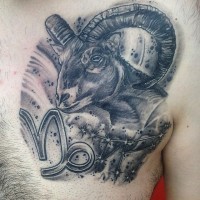 3D like black and white goat head tattoo on chest with zodiac symbol