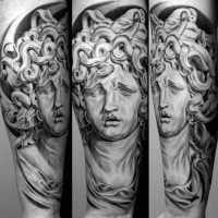 3D like black and white Medusa statue tattoo on arm