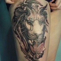 3D like colored demonic lion face tattoo on thigh with butterfly