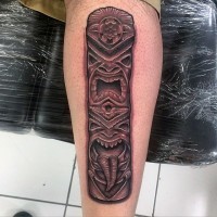 3D like colored tribal old statue tattoo on leg