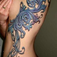3D like cute unnatural designed floral tattoo on side