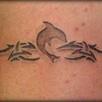 3D like little tribal dolphin tattoo on leg