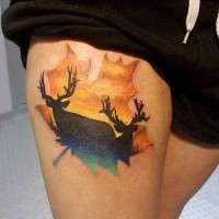 3D like multicolored maple leaf stylized with deer and sun tattoo on thigh