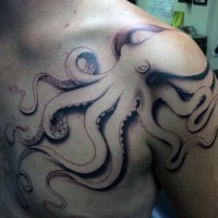 3D like uncolored big octopus tattoo on shoulder