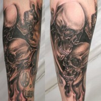 3D realistic massive black and white skulls in flames tattoo on arm