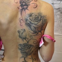 3D realistic massive very realistic flowers tattoo on back