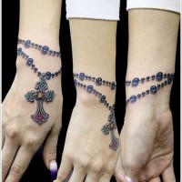 3d realistic rosary wrist tattoo