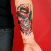 3d red lips and rose forearm tattoo