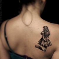 3D style accurate painted black ink girl tattoo on upper back