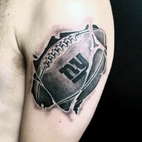 3D style amazing looking shoulder tattoo of American football ball