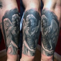 3D style black and white forearm tattoo of angel statue