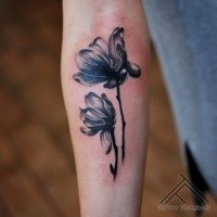 3D style black ink forearm tattoo of beautiful flowers