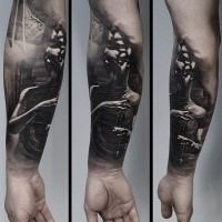 3D style black ink forearm tattoo of creepy human figure