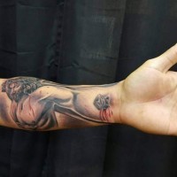 3D style colored dramatic tattoo on forearm of wounded Jesus