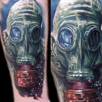 3D style colored forearm tattoo of man in gas mask
