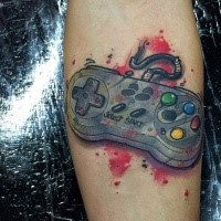 3D style colored forearm tattoo of old joystick
