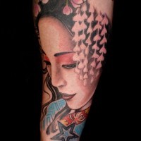 3D style colored sad geisha portrait tattoo on forearm combined with flowers