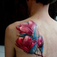 3D style colored scapular tattoo of beautiful flowers