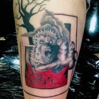 3D style colored shoulder tattoo of werewolf with lettering