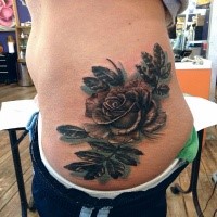 3D style colored waist tattoo of rose with feather