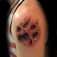 3D style detailed shoulder tattoo of animal paw print