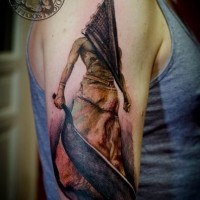 3D style horrifying Pyramidhead monster tattoo on shoulder