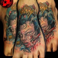 3D style multicolored severed head Asian woman head tattoo on foot with bloody knife