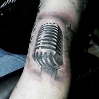 3D style painted big black and white microphone tattoo on arm