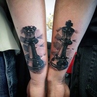 3D style very detailed arm tattoo of various chess figures