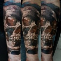 3D style very detailed forearm tattoo of human skull