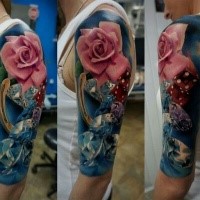 3D style very detailed shoulder tattoo of pink rose with diamonds