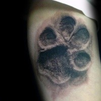 3D style very detailed tattoo of cool looking animal paw print