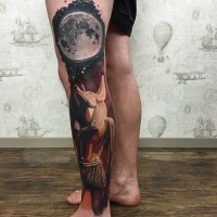 3D very cool looking colored Egypt god statue tattoo on leg combined with big moon